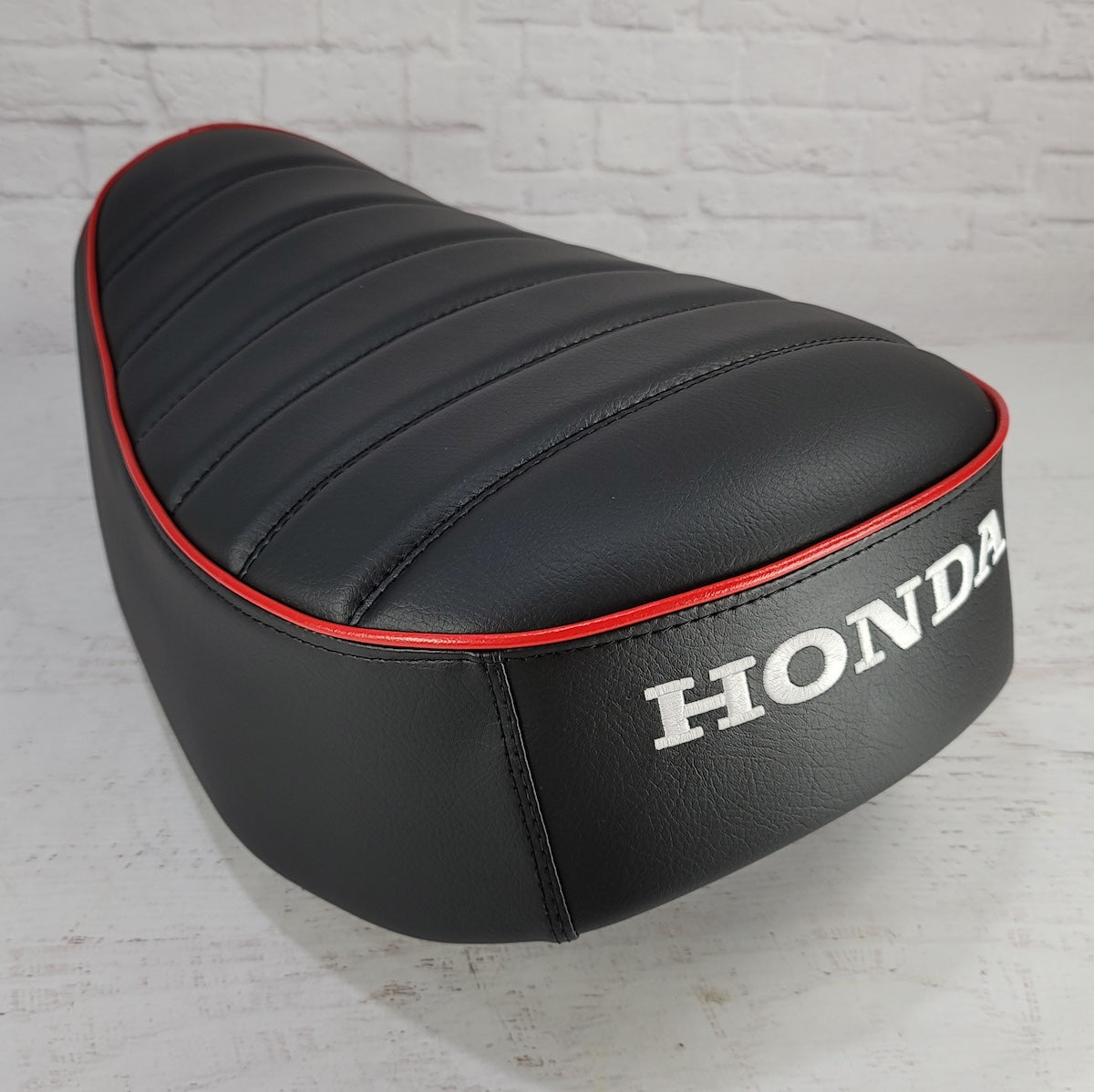 Honda Monkey wide tuck-and-roll seat cover with piping