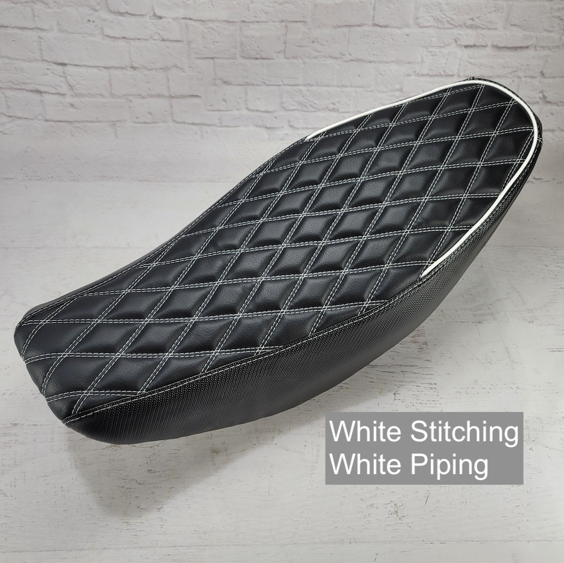 Honda Navi double-diamond seat cover with white stitching and piping