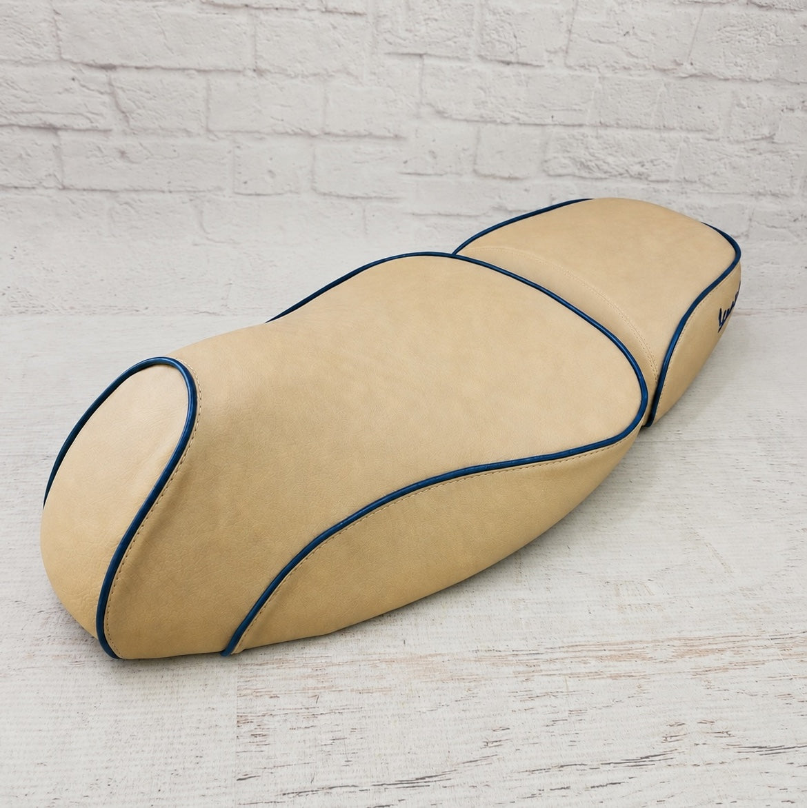 Vespa GTV camel tan seat cover with Midnight Blue piping