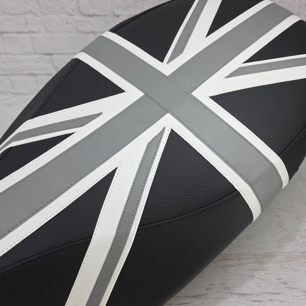 Vespa Sprint / Primavera Black and Gray Union Jack Seat Cover by Cheeky Seats