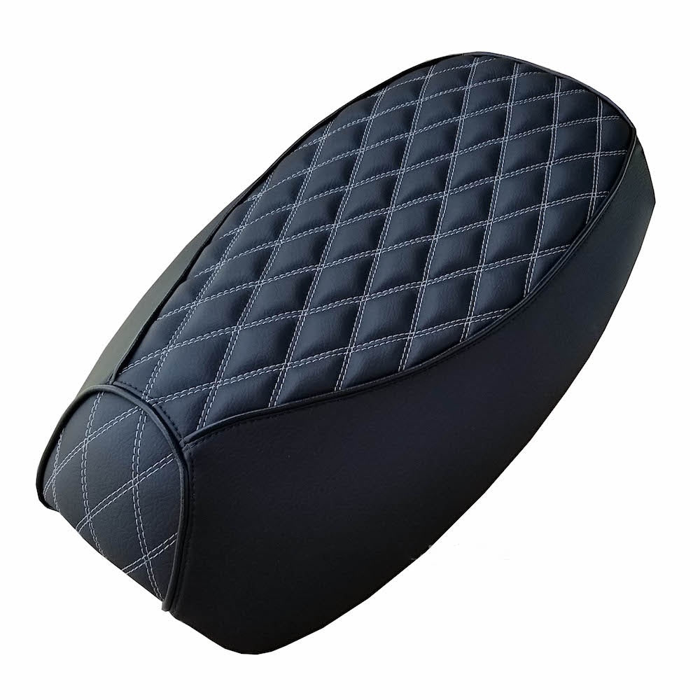 Black Double Diamond Yamaha Vino 125 seat cover with white contrast stitching and a quilted center panel, handmade by Cheeky Seats.