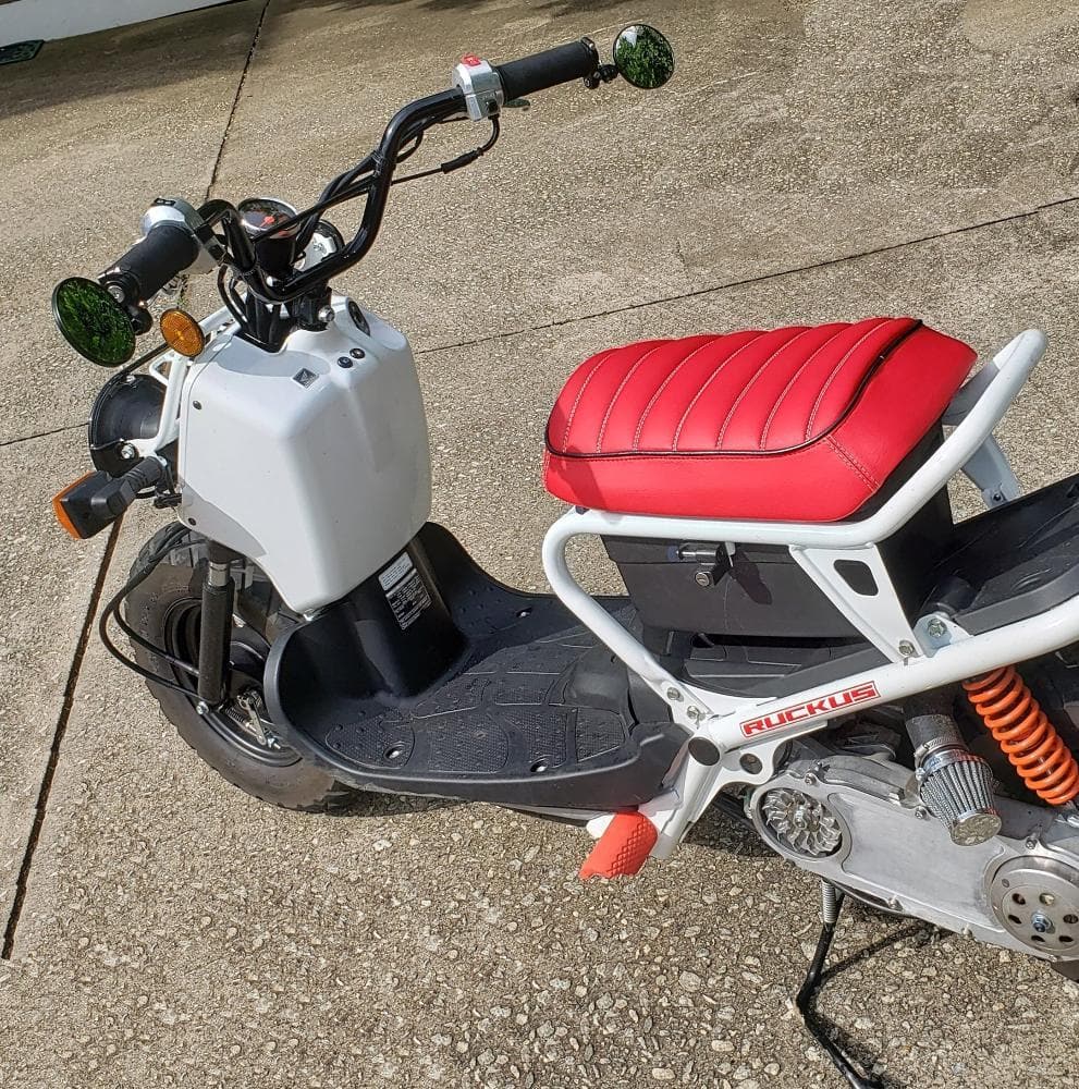 Honda Ruckus red padded tuck and roll seat cover