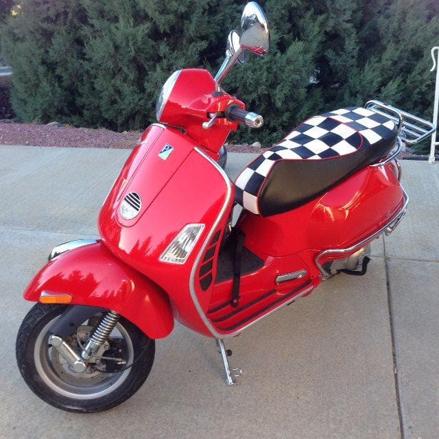 Vespa GTS checkers seat cover on scooter