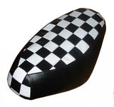 Black-and-white checkerboard Cheeky Seats cover for a Genuine Buddy standard seat, studio view