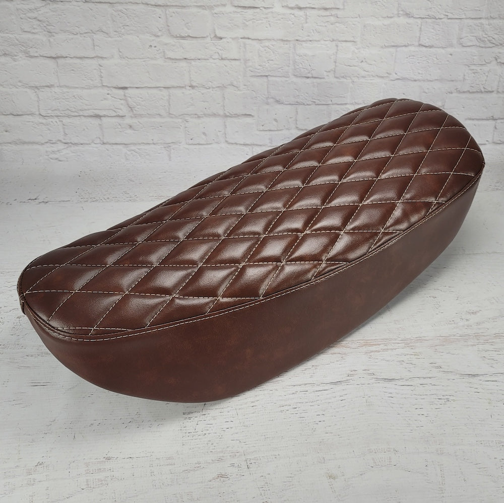 Whiskey brown diamond stitched Honda DAX 125 seat cover with warm cream stitching, handmade by Cheeky Seats