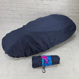 Navy Honda DAX 125 protective seat cover with a compact pouch, blue floral strap and small clip, by Cheeky Seats