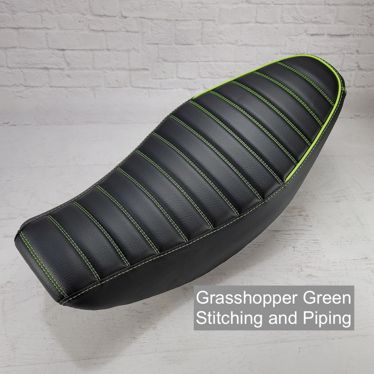Honda Navi tuck-and-roll seat cover with Grasshopper Green details