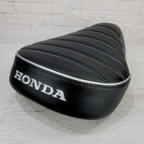 Honda Super Cub black tuck and roll seat cover