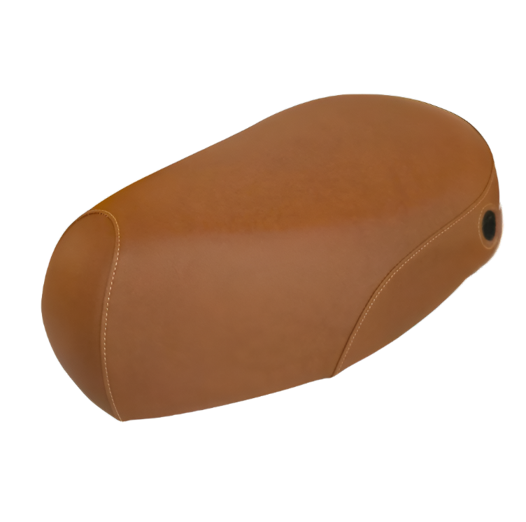 Cinnamon brown Kymco People 50 seat cover in a smooth warm tan finish, three-quarter view with tan stitching and a lock-opening grommet visible, handmade by Cheeky Seats