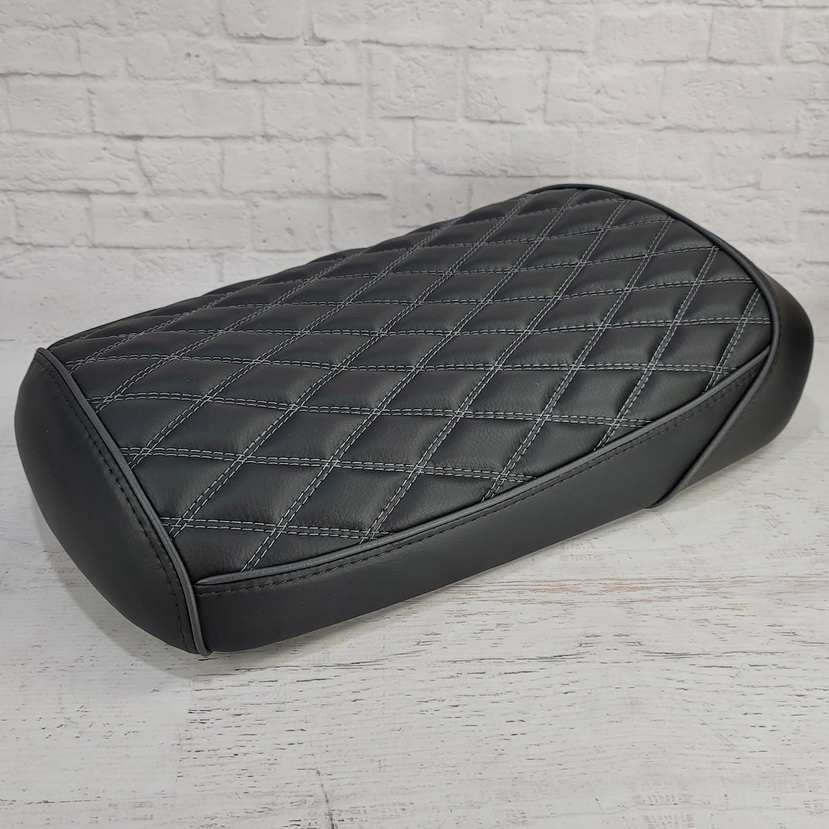 Maddog 50 150 Matte Black diamond-stitched seat cover with dark gray stitching and piping, handmade by Cheeky Seats 