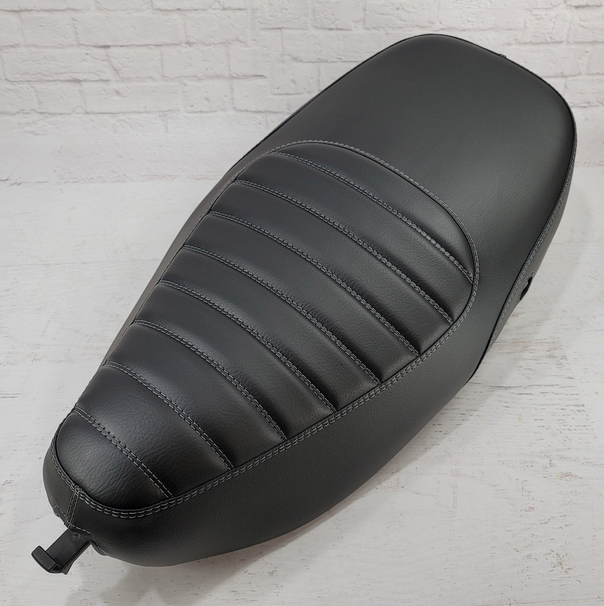 Vespa LX black padded seat cover by Cheeky Seats
