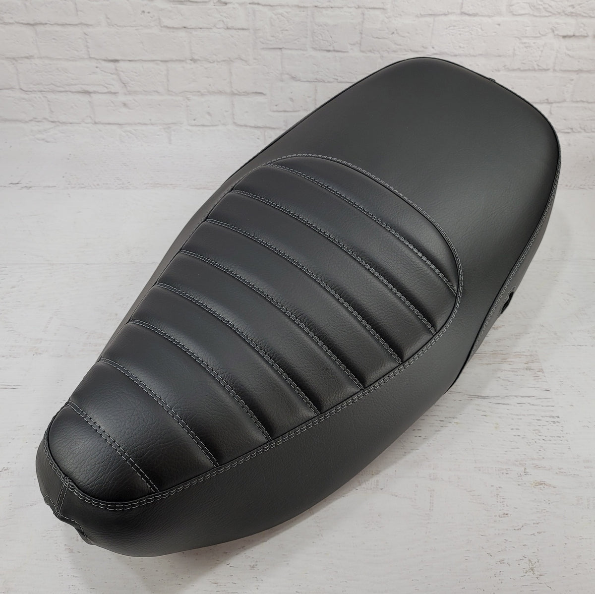 Vespa LX black padded seat cover side angle