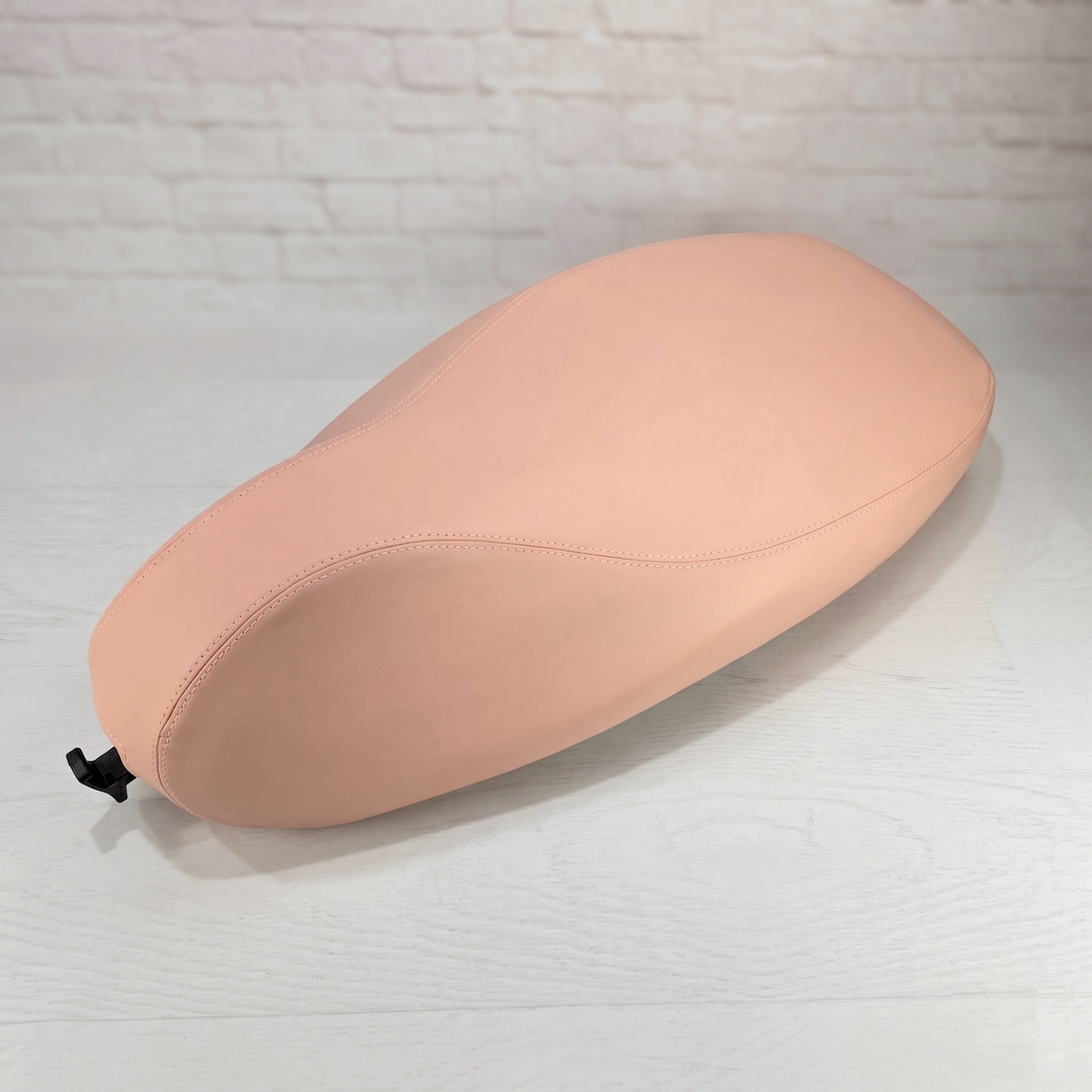 Peach Summer seat cover tailored for Vespa Sprint, LX and ET models, with softly structured French seams, handmade by Cheeky Seats.