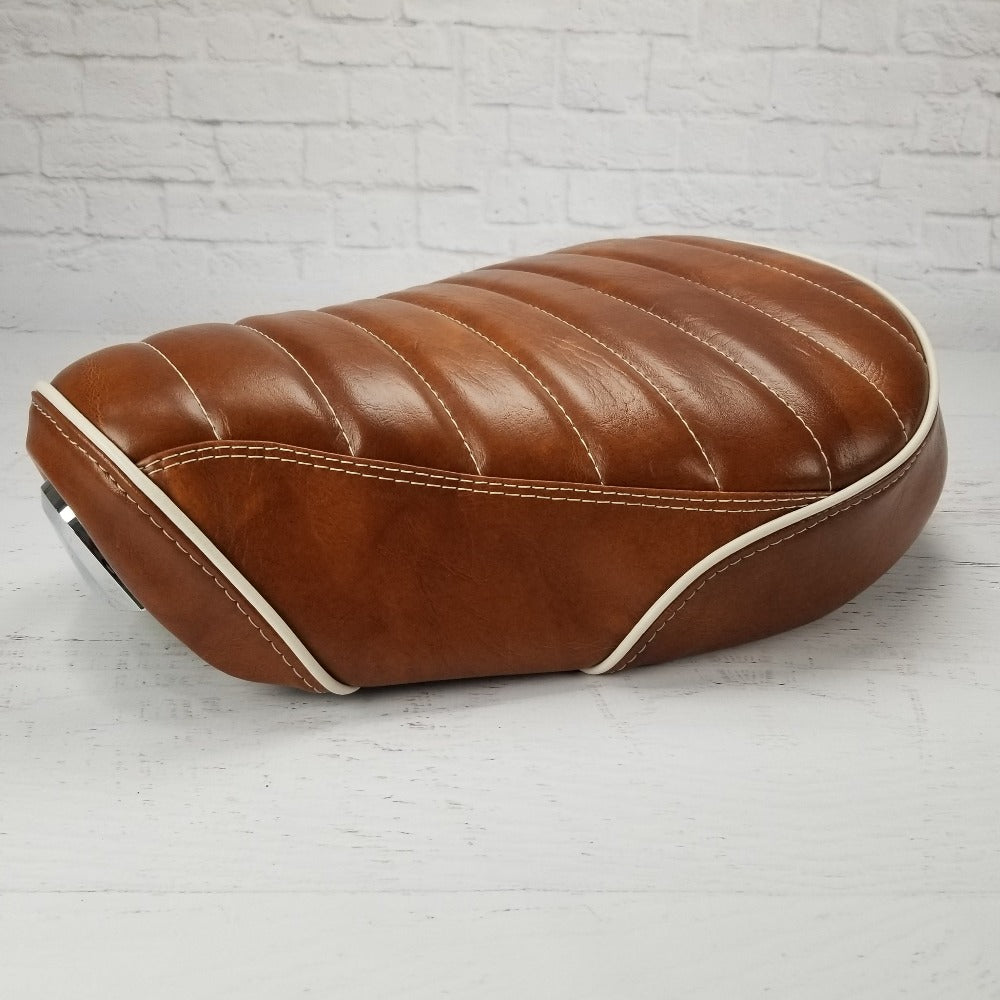 Honda Super Cub cognac tuck and roll seat cover side view