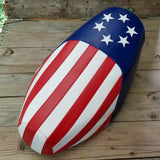 Cheeky Seats American flag cover for a Genuine Buddy seat with blue star field and red-white stripes