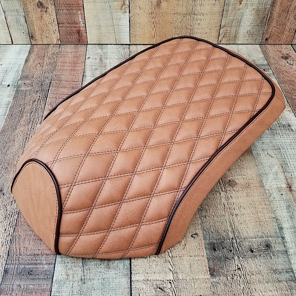 Tan diamond-quilted seat cover shaped for Yamaha C3, XF50, Vox and Giggle scooters, finished with dark piping, handmade by Cheeky Seats.